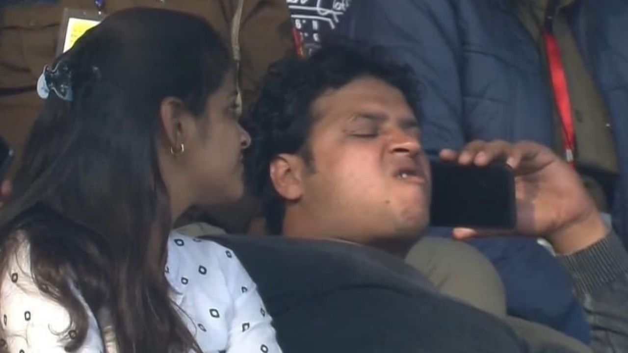Shobhit Pandey shot to fame after a video of him talking over the phone during the ongoing first Test match between India and New Zealand went viral. Credit: Screegrab/Twitter/@effucktivehumor