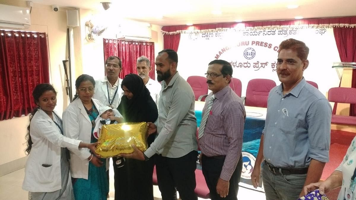 Couple Anwar and Sabiya are felicitated with a kit from Ayush department.