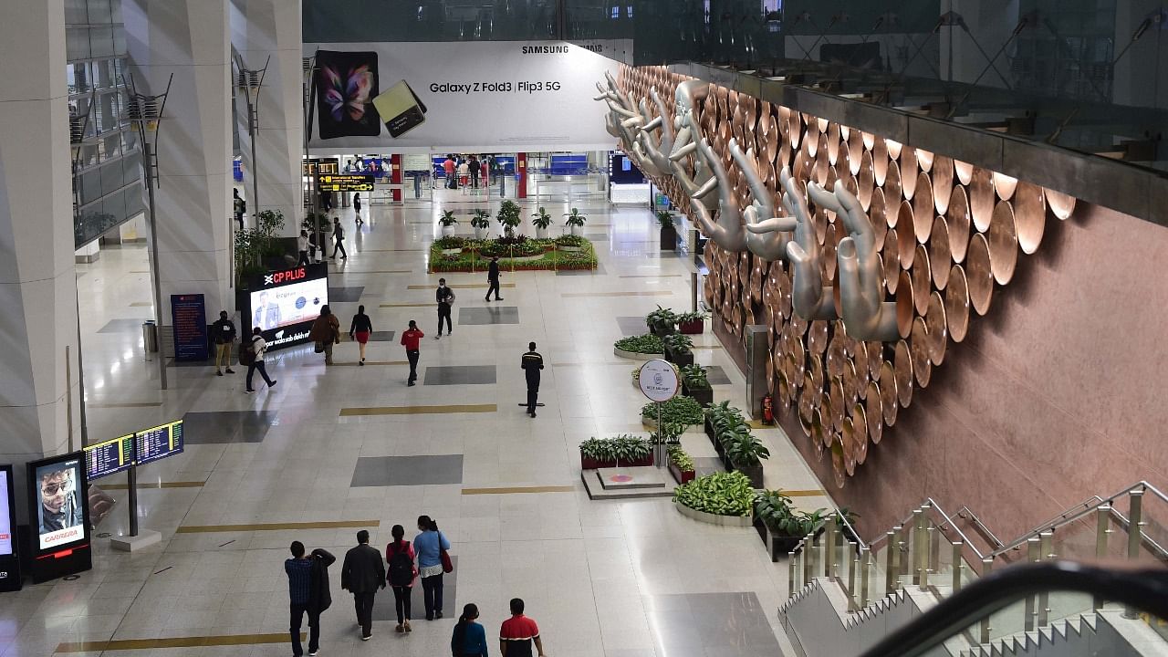 Passengers at Delhi airport. Credit: PTI Photo