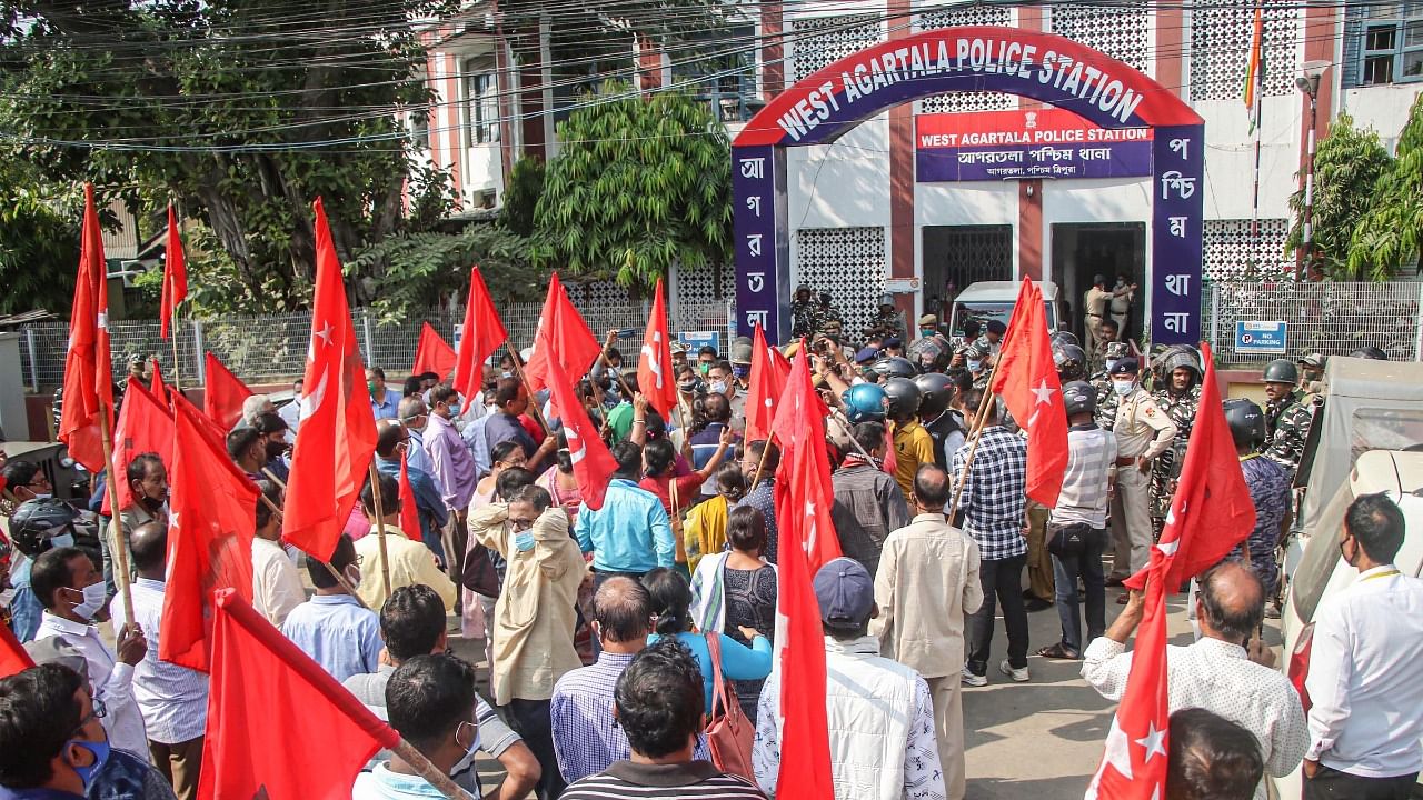 CPI(M) supporters protest in front of the West Agartala Police Station during the municipal corporation elections, in Agartala. Credit: PTI File Photo