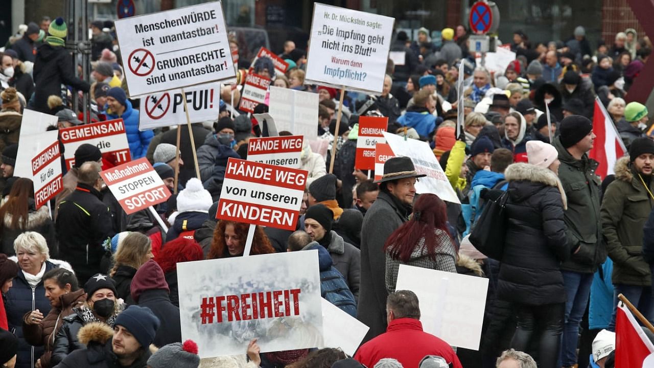 Demonstrators protest against the government's coronavirus measures on November 27, 2021 in Klagenfurt, Austria. Credit: AFP Photo