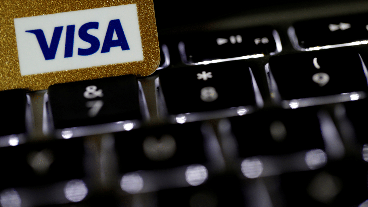 A Visa credit card is seen on a computer keyboard. Credit: Reuters Photo