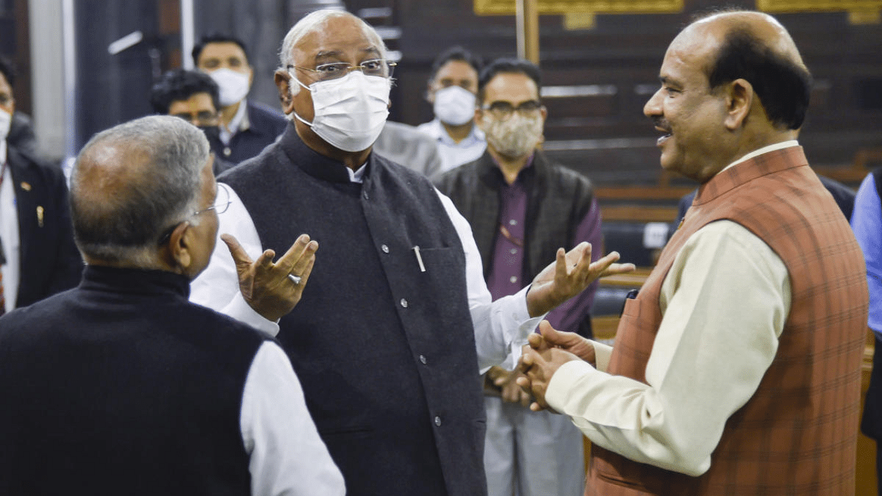  Lok Sabha Speaker Om Birla interacts with senior Congress leader Mallikarjun Kharge during an event to pay tribute to late former speaker of Lok Sabha G.V. Mavalankar on the occasion of his birth anniversary, at Parliament. Credit: PTI Photo