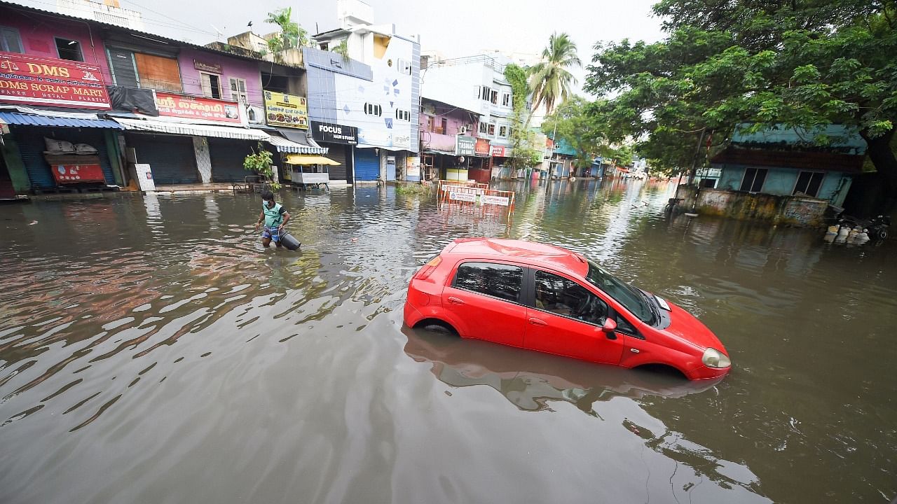 A car stuck on a waterlogged street following heavy rain in Chennai. Credit: PTI File Photo