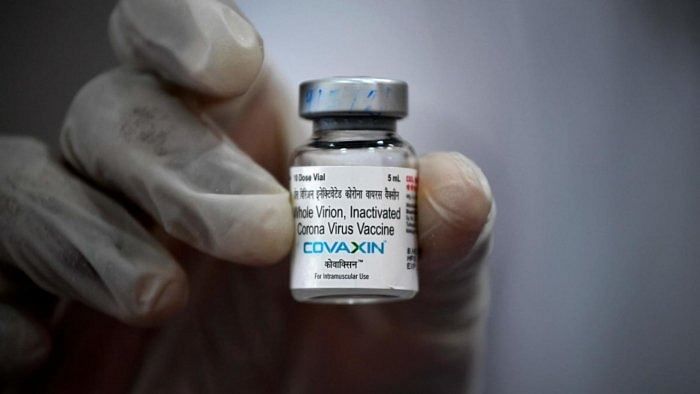 A medical worker displays a vial of the Covaxin vaccine against the Covid-19 coronavirus at a vaccination centre in Mumbai. Credit: AFP Photo