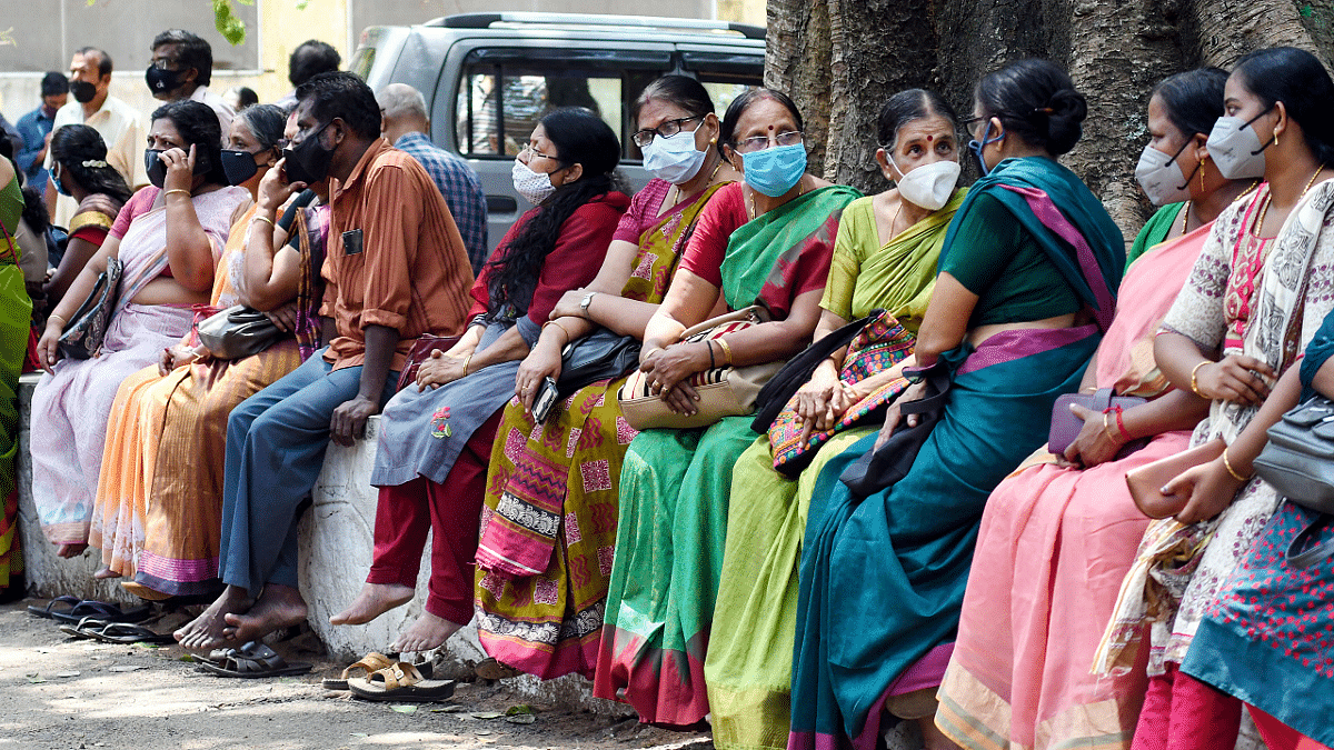 People wait to be vaccinated for Covid-19 at the General Hospital. Credit: PTI Photo