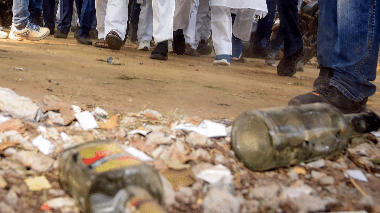 The bottles were found under a tree in the area earmarked as parking lot for two-wheelers. Credit: PTI Photo