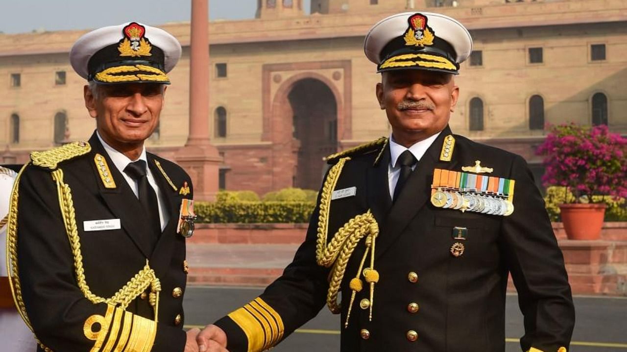 The newly-appointed Naval Chief Admiral R Hari Kumar (R) being welcomed by the outgoing Naval Chief Admiral Karambir Singh at South Block, in New Delhi, Tuesday, Nov 30, 2021. Credit: PTI Photo