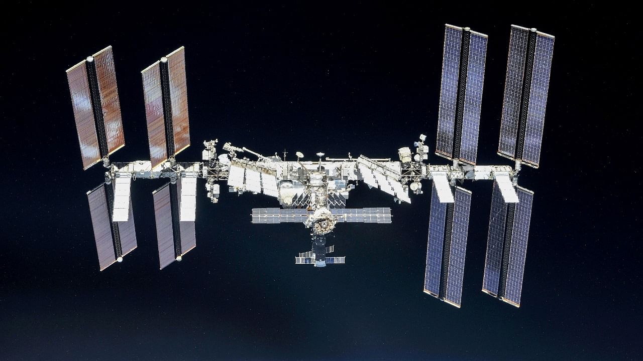 Astronauts have lived and worked onboard the ISS orbiting roughly 250 miles above the Earth's surface for more than 20 years. Credit: Reuters Photo