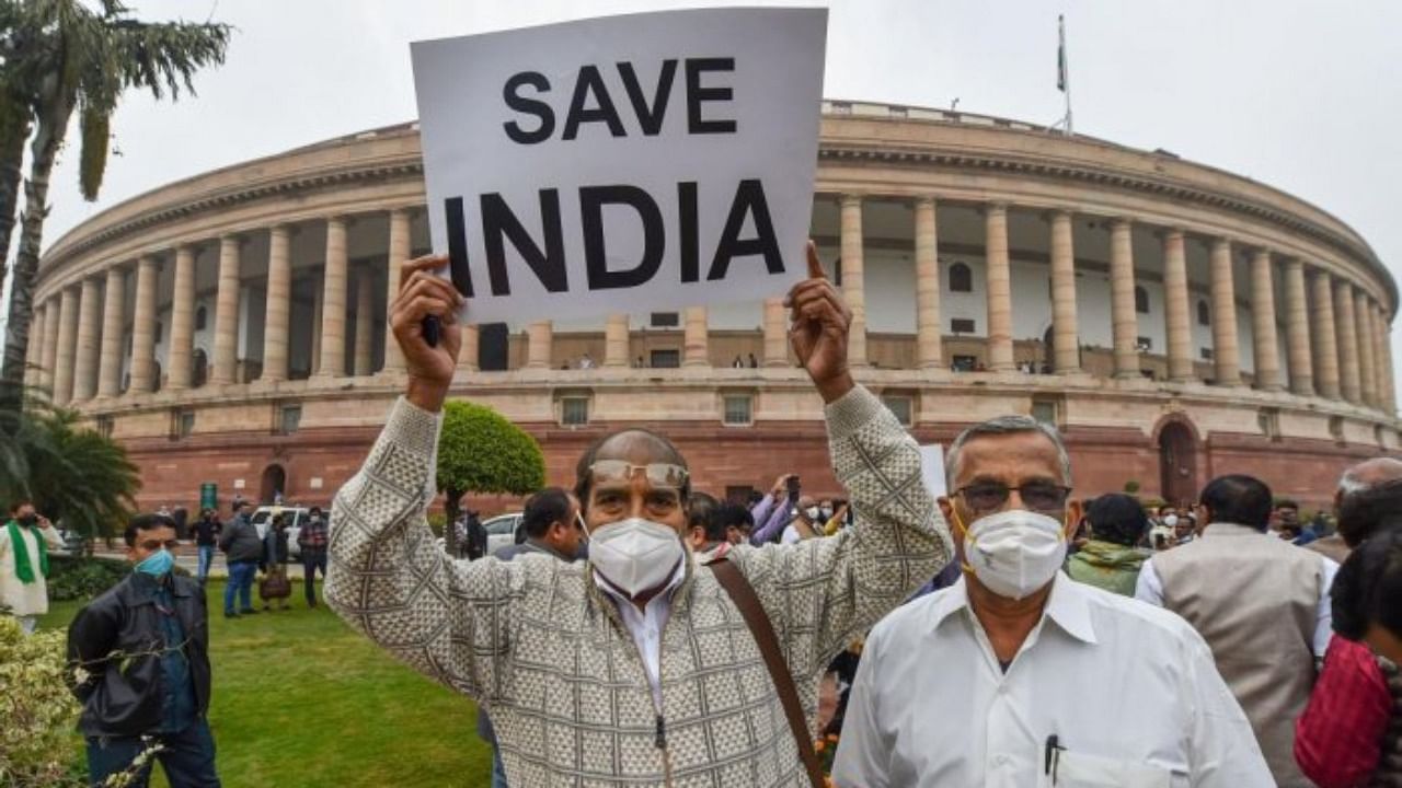 Opposition parties' MPs protest over suspension of 12 Rajya Sabha MP's during the Winter Session of Parliament, in New Delhi, Wednesday, December 1, 2021. Credit: PTI Photo