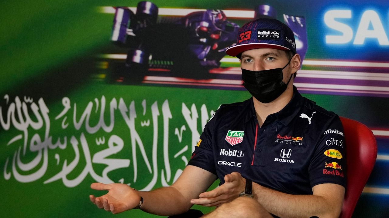 Red Bull's Dutch driver Max Verstappen gestures during press conference ahead of the Saudi Arabian Grand Prix at the Jeddah Corniche Circuit in Jeddah, Saudi Arabia, on December 2, 2021. Credit: AFP Photo