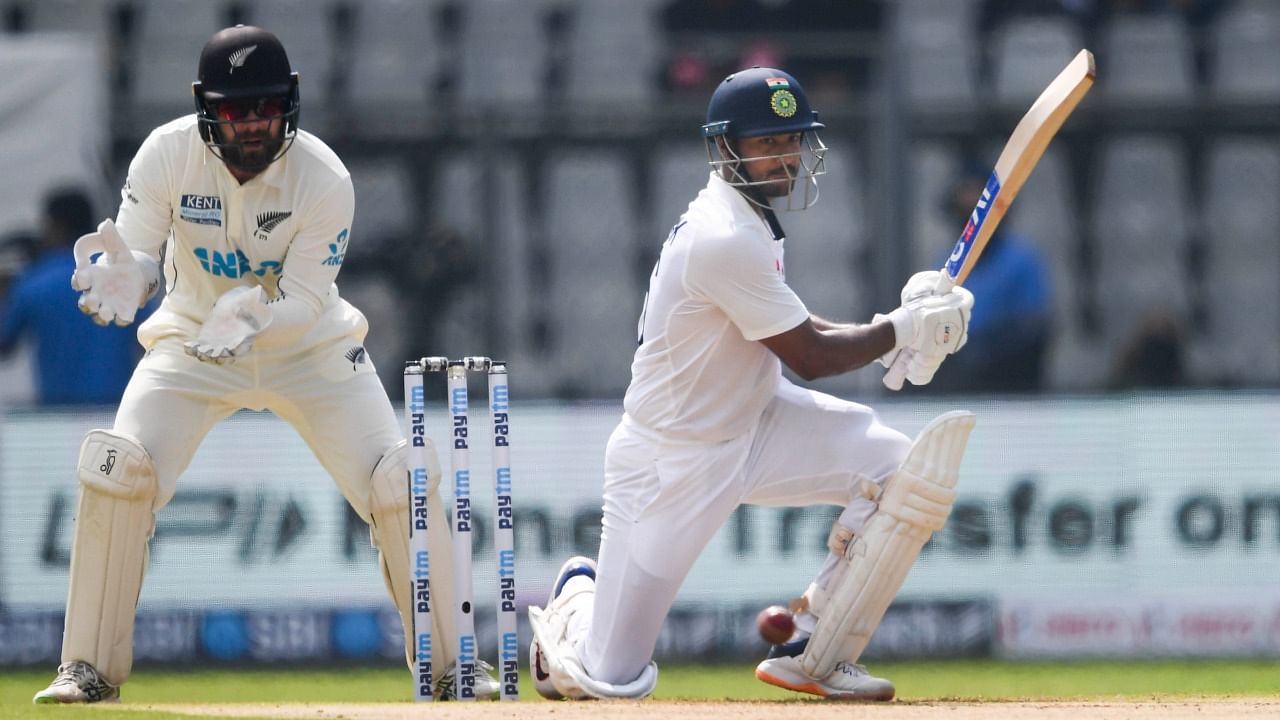 Mayank Agarwal plays a shot on the first day of the 2nd test cricket match between India and New Zealand, at Wankhede Stadium in Mumbai. Credit: PTI Photo