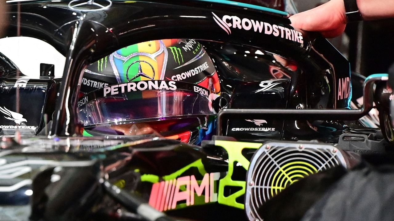 Mercedes' British driver Lewis Hamilton sits in his car in the pits during the second practice session of the Saudi Arabian Grand Prix at the Jeddah Corniche Circuit in Jeddah on December 3, 2021. Credit: AFP Photo