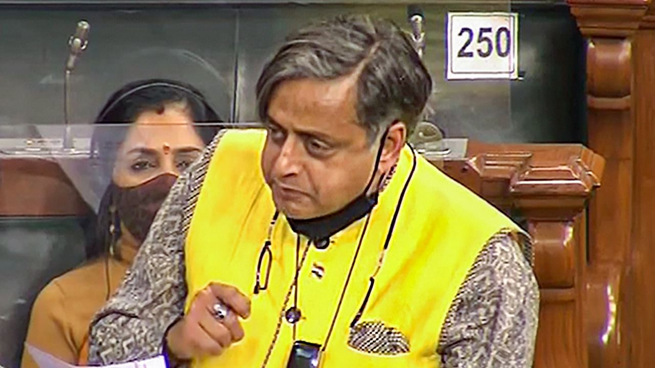 Tharoor speaks in the Lok Sabha during ongoing Winter Session of Parliament, in New Delhi, Wednesday. Credit: PTI File Photo