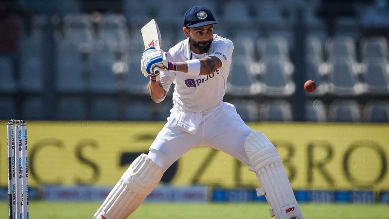 India's captain Virat Kohli plays a shot during the third day of the second Test cricket match between India and New Zealand at the Wankhede Stadium. Credit: AFP Photo