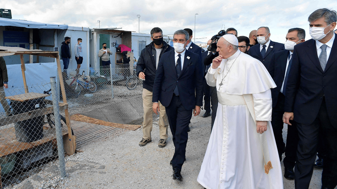 Pope Francis meeting refugees at the Reception and Identification Centre in Mytilene on the island of Lesbos. Credit: AFP Photo