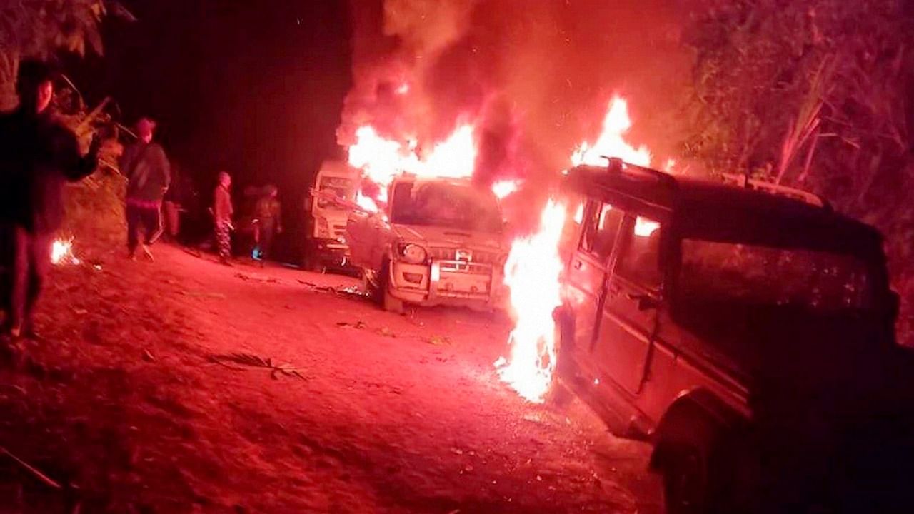 Mob sets fire to vehicles of the army personnel in Mon. Credit: PTI Photo