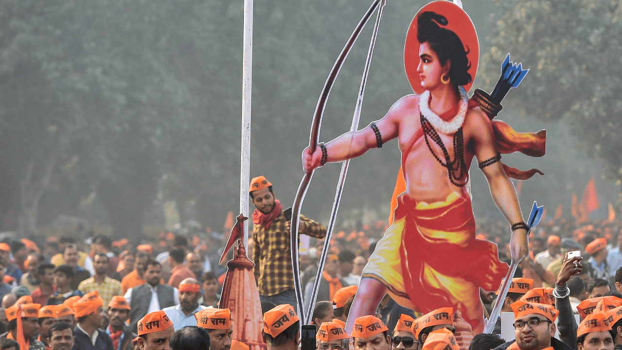 Vishwa Hindu Parishad’s (VHP) supporters carry a cutout of Lord Ram during ‘Dharma Sabha’. Credit: PTI Photo