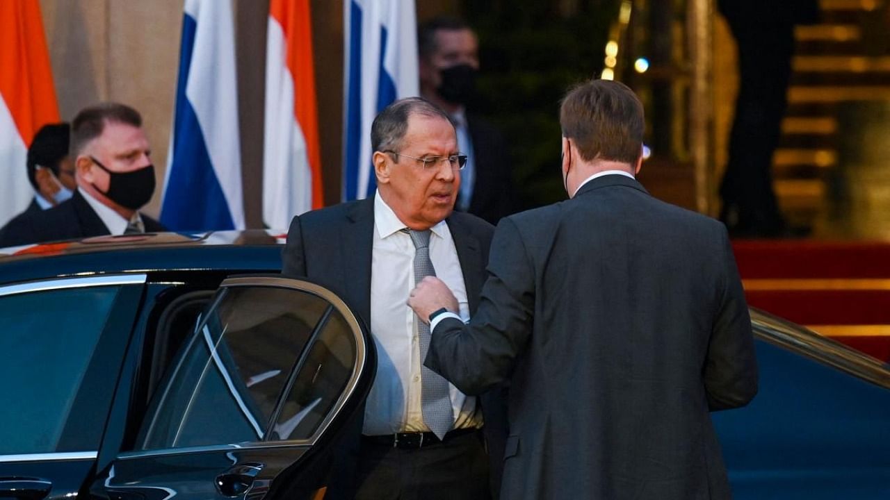 Russian Foreign Minister Sergey Lavrov (C) arrives for a meeting at Hyderabad House in New Delhi. Credit: AFP Photo