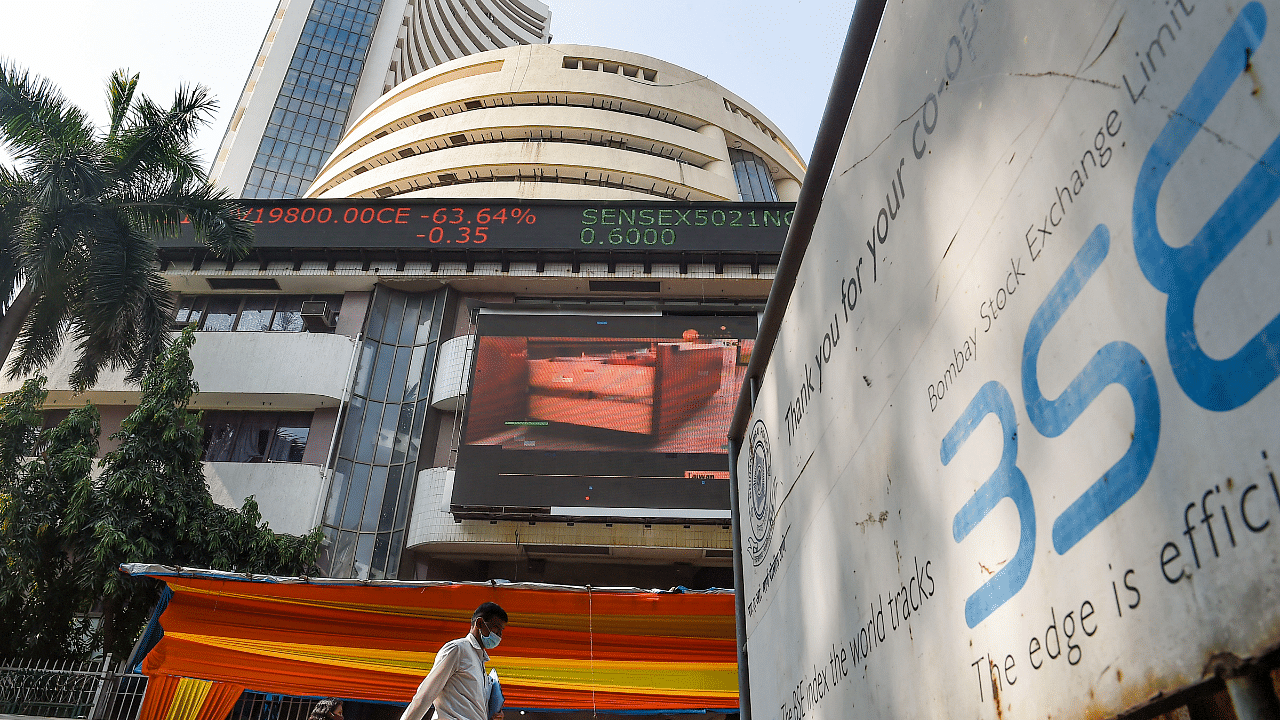 Pedestrians walk past the Bombay Stock Exchange (BSE) building. Credit: PTI Photo