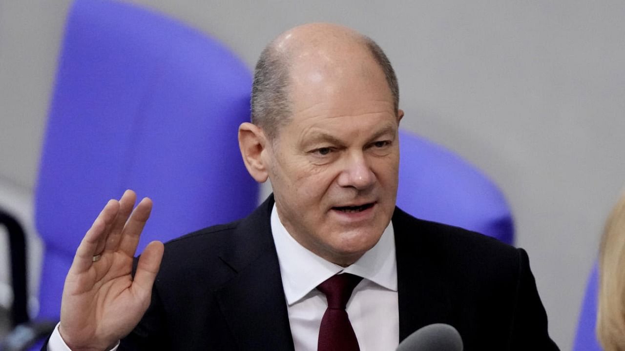 New elected German Chancellor Olaf Scholz is sworn in by parliament President Baerbel Bas in the German Parliament Bundestag in Berlin. Credit: AP/PTI photo