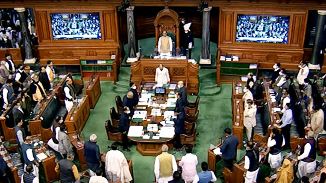 Lok Sabha observes two-minute silence on the demise of Chief of Defence Staff General Bipin Rawat, his wife, and other personnel in yesterday's military helicopter crash near Coonoor (Tamil Nadu), during the ongoing winter session of the Parliament in New Delhi on Thursday. Credit: PTI Photo