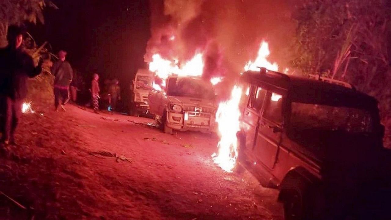 Angry villagers burn vehicles belonging to security personnel after 13 civilians were killed by the security forces from Assam Rifles in an anti-insurgency operations, at Oting village under Mon district of Nagaland. Credit: PTI Photo