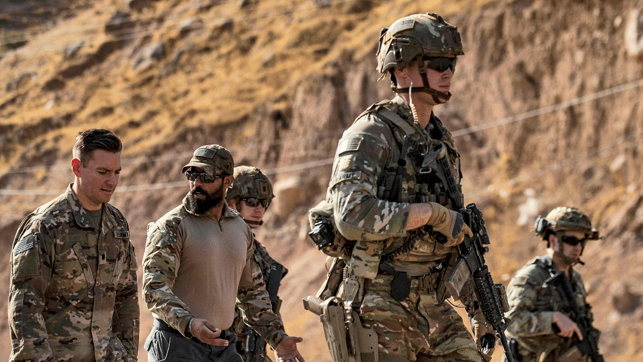 US soldiers patrol an area near Syria's northeastern Semalka border crossing with Iraq's Kurdish autonomous territory. Credit: AFP File Photo