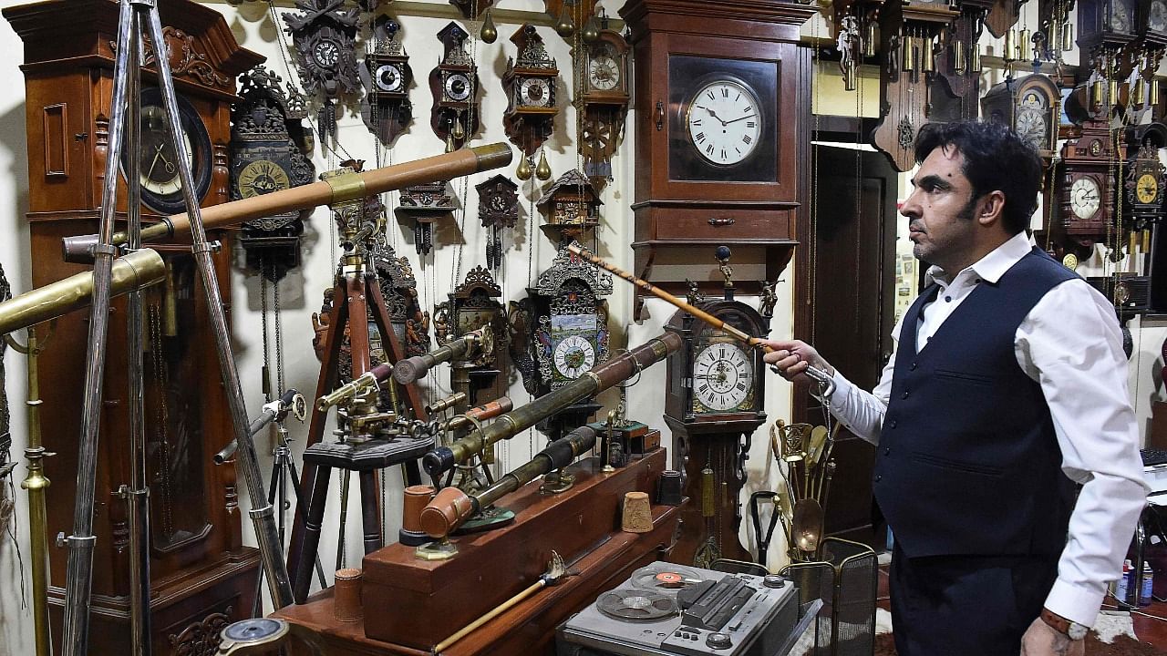 Kakar shows his antique clocks at a museum housed inside the city's tribal police headquarters compound in Quetta. Credit: AFP Photo