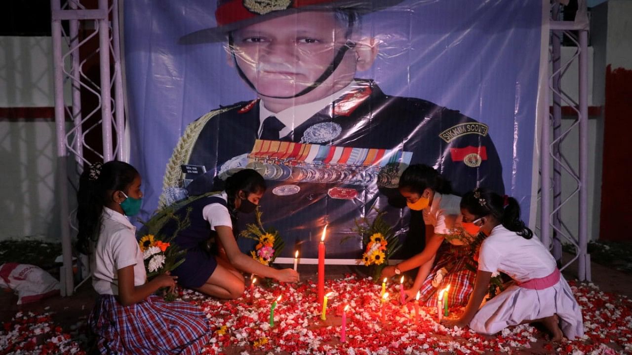 People pay their respect to India's Chief of Defence Staff General Bipin Rawat, in Kolkata. Credit: Reuters Photo