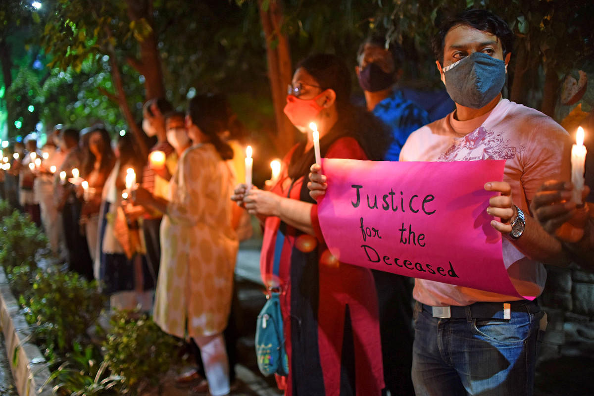 The candlelight vigil at Indiranagar on Friday. DH PHOTO/PUSHKAR V