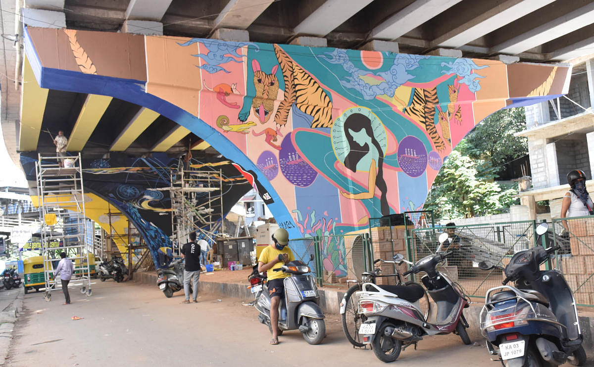 Murals on the pillars of the Wheeler Road flyover in Cox Town. Credit:  DH PHOTO/B K Janardhan