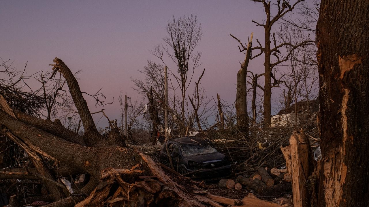 A destroyed vehicle sits in the aftermath of a tornado in Mayfield. Credit: Reuters Photo