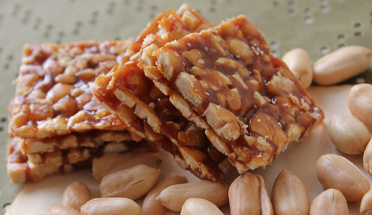 The government has decided to replace bananas with groundnut-jaggery chikki for schoolkids who do not eat eggs. Credit: DH File Photo