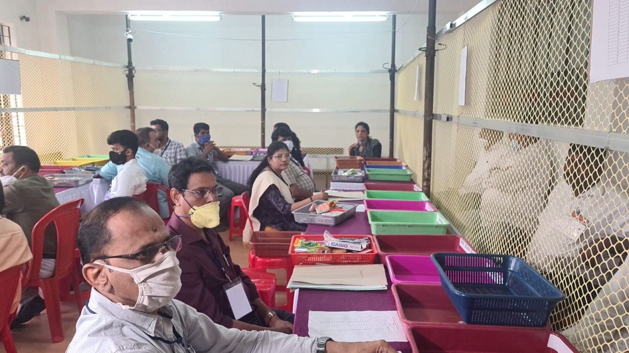 Officials at the counting centre in Rosario School in Mangaluru. Credit: DH Photo