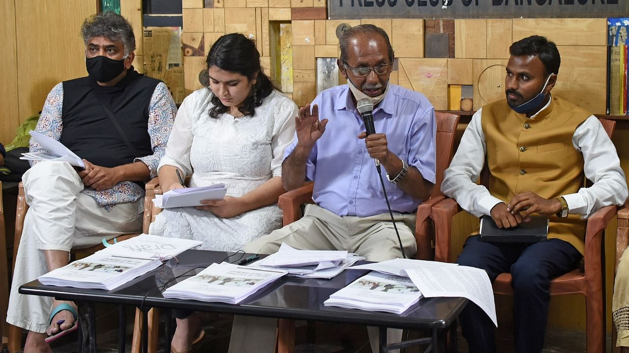 Members of the People's Union for Civil Liberties speak during the release of the report at the Press Club of Bangalore. Credit: DH Photo/Pushkar V