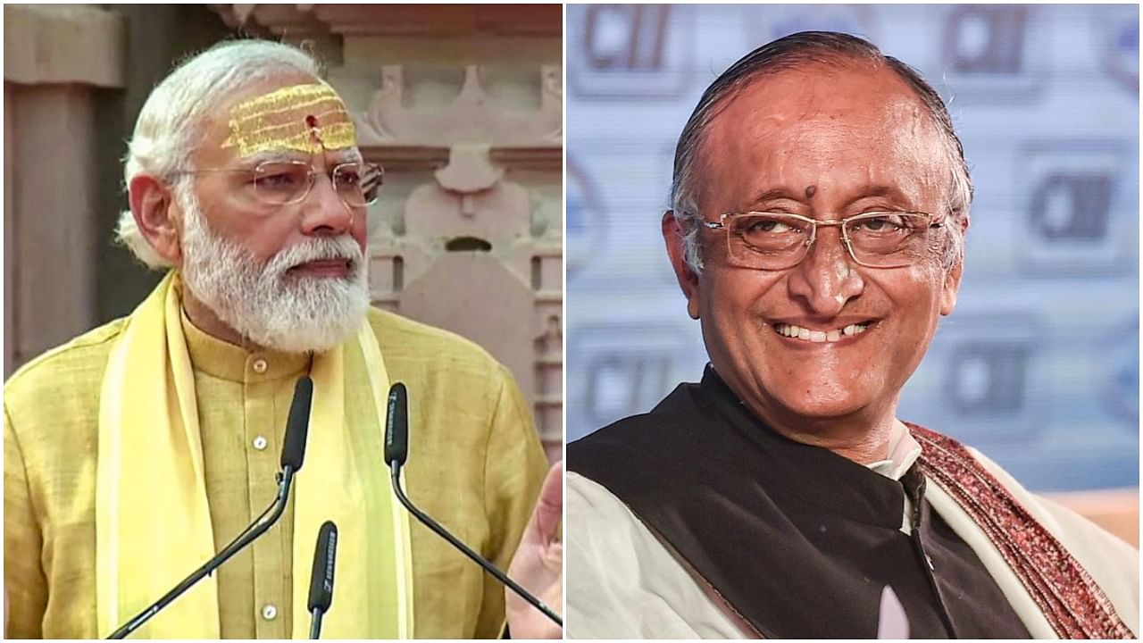 Prime Minister Narendra Modi and West Bengal’s former finance minister Amit Mitra. Credit: PTI Photos