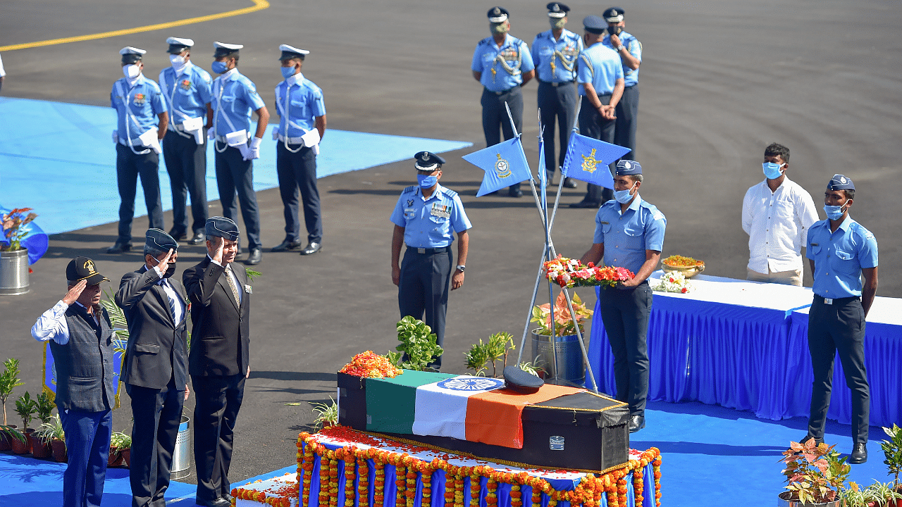 Family and friends pay tribute to the mortal remains of late Group Captain Varun Singh during a wreath laying ceremony at Yelahanka Air Force station, in Bengaluru. Credit: PTI Photo