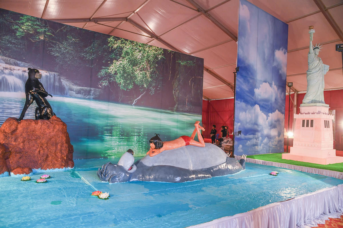 Jungle Book and Statue of Liberty models at the cake show venue on Wednesday. Credit: DH Photo/S K Dinesh