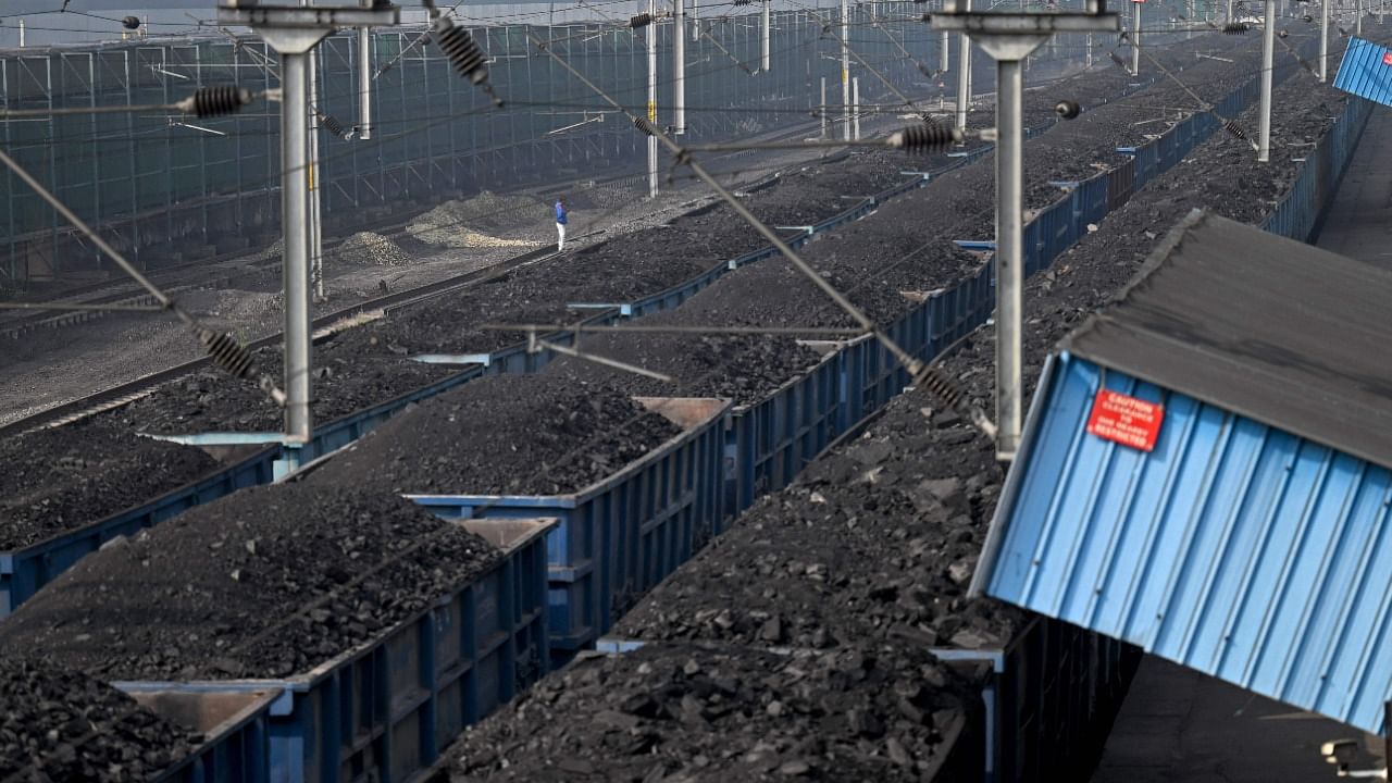 Carriages of goods trains loaded with coal are pictured at a railway station in Singrauli, Madhya Pradesh. Credit: AFP File Photo