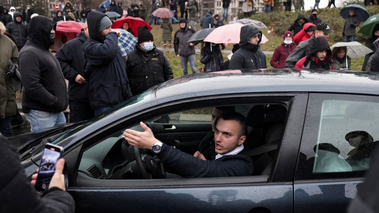 A man gestures during a protest as environmental activists block the E-75 highway to demonstrate against Rio Tinto's plans to open a lithium mine, in Belgrade, Serbia, December 11, 2021. Credit: Reuters File Photo