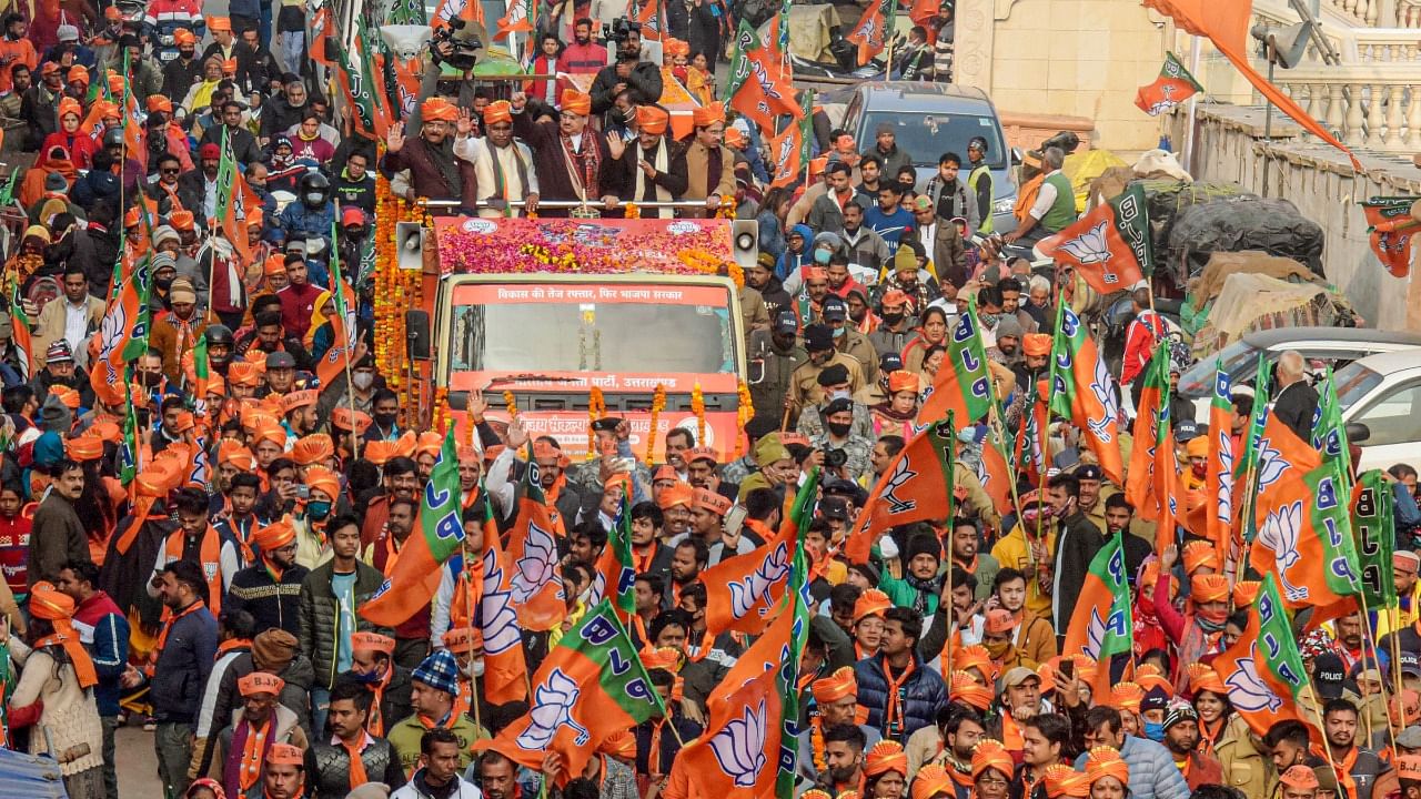 BJP National President J.P. Nadda with former union minister Ramesh Pokhriyal, Uttarakhand BJP President Madan Kaushik and others, during BJP's 'Vijay Sankalp Yatra' in Haridwar, Saturday. Credit: PTI Photo