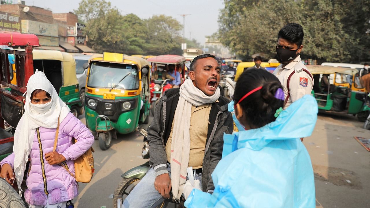 The number of Covid cases recorded in Delhi so far has reached 14,42,197. Credit: Reuters File Photo