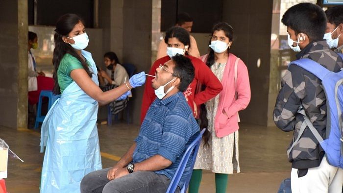 To avert such clusters, the TAC had recommended that at entry, all shall be screened for Covid symptoms, hand sanitiser applied, thermal scanning done, and physical distance of at least one metre/three feet ensured throughout. Credit: DH Photo