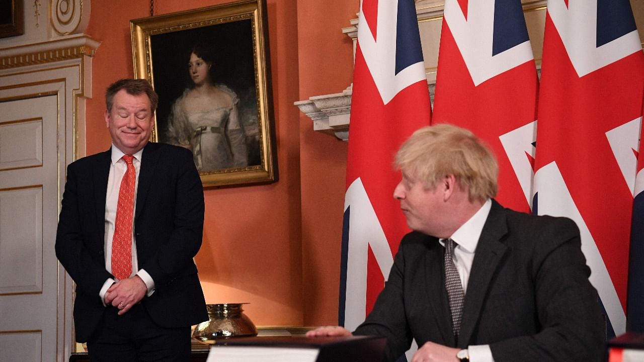 British Prime Minister Boris Johnson and Former Brexit negotiator David Frost. Credit: AFP File Photo