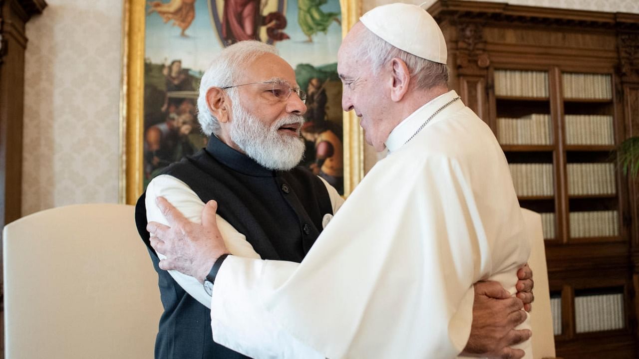 Prime Minister Narendra Modi and Pope Francis hug on the occasion of their private audience at the Vatican. Credit: AP Photo
