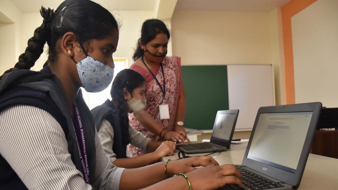 Many students at BBMP schools are using laptops for the first time. Credit: DH Photo/B K JANARDHAN