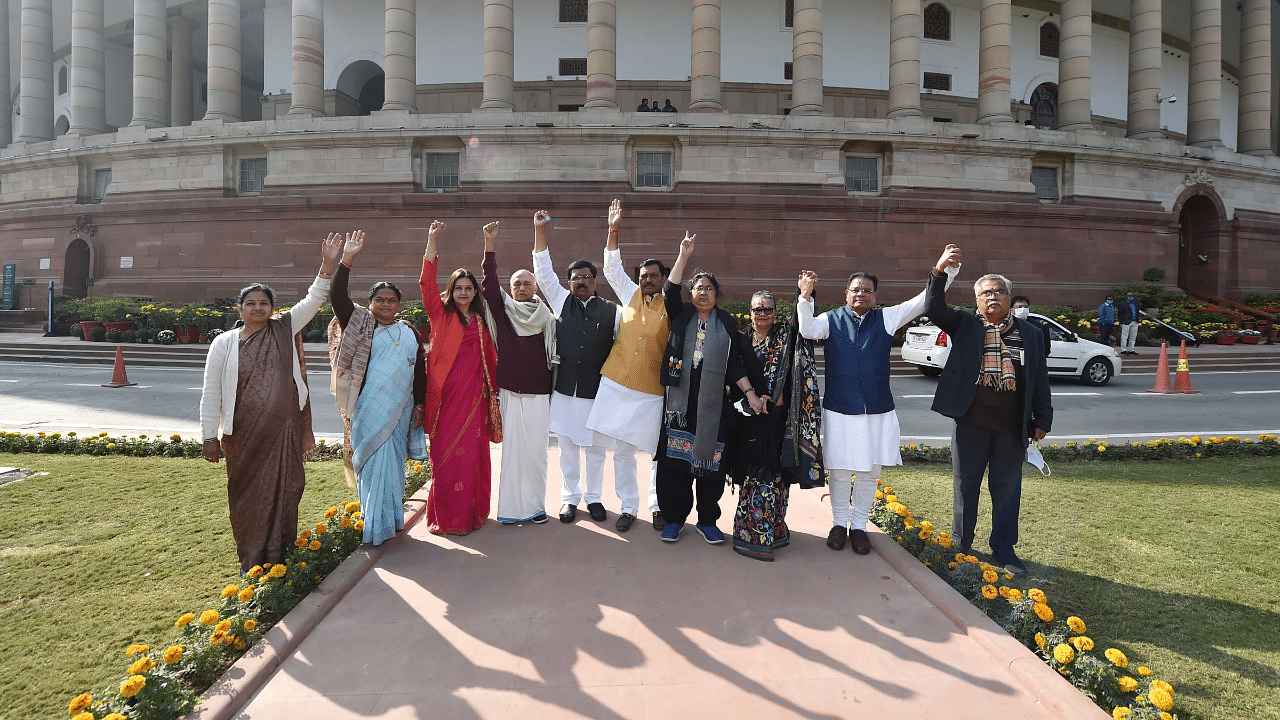 Suspended Rajya Sabha MPs during a protest demanding for revocation of their suspension. Credit: PTI Photo