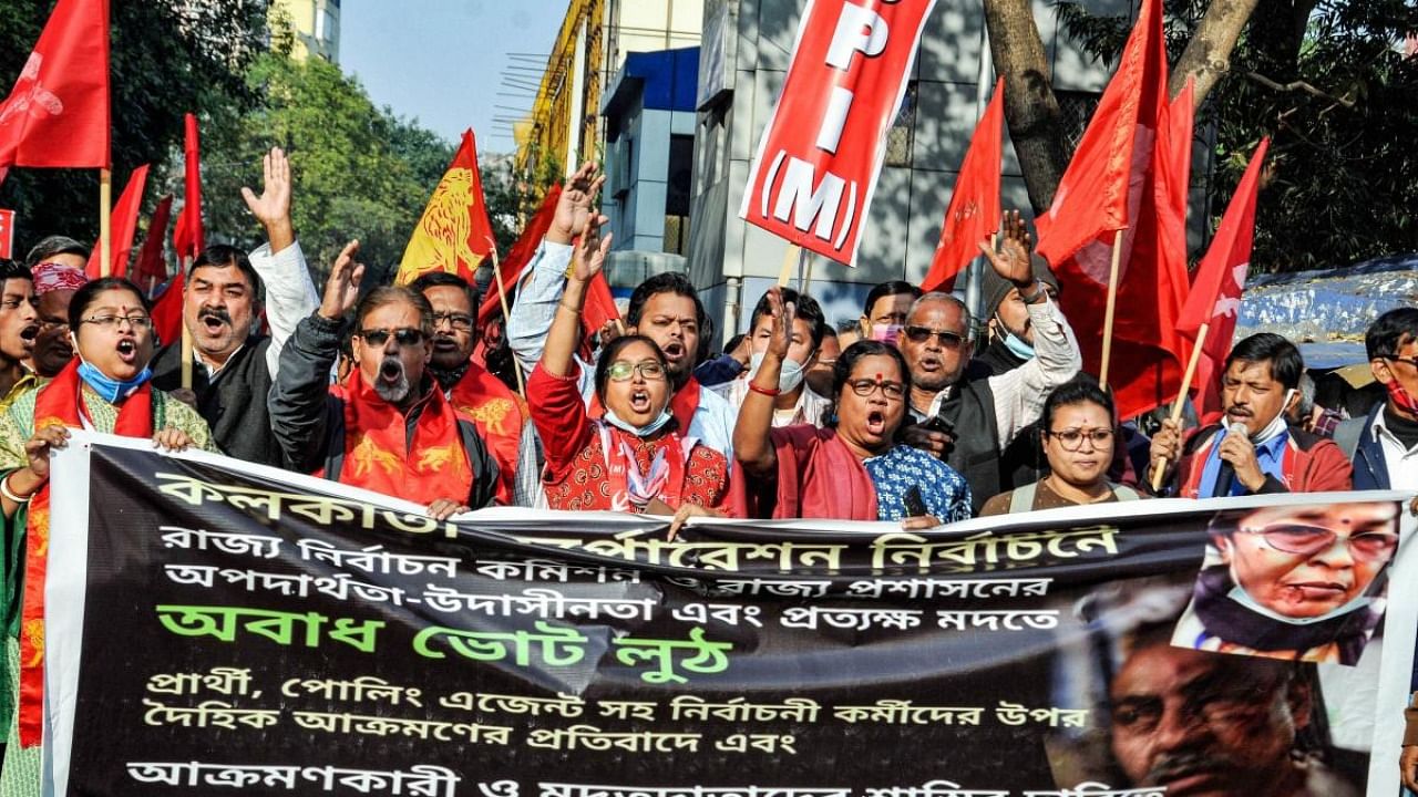 Left Front activists protest against the alleged rigging and violence in yesteday's Kolkata Municipal Corporation (KMC) elections, at West Bengal State Election Commission office, in Kolkata. Credit: PTI Photo