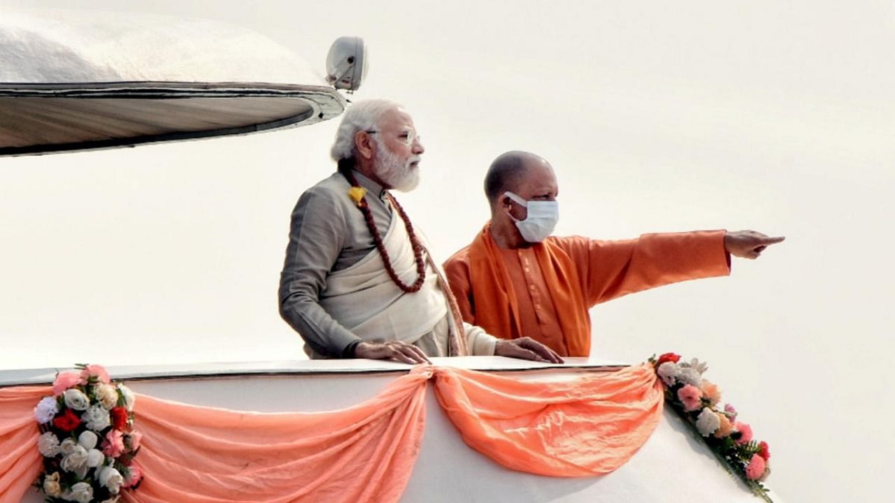 Prime Minister Narendra Modi with UP CM Yogi Adityanath on board a cruise ship during his visit to Varanasi. Credit: PTI Photo